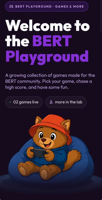 A promotional graphic for "BERT Playground" featuring a cute cartoon bear wearing a red hat and blue hoodie, lounging on a beanbag while holding a phone. The image displays "Welcome to the BERT Playground," describes it as "A growing collection of games made for the BERT community," and notes "02 games live" and "more in the lab," introducing the new gaming hub mentioned in the post about Flappy BERT and the Autumn Tournament.