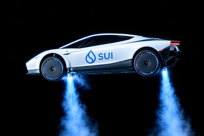 A futuristic white sports car with the 'SUI' logo displayed on its side hovers in mid-air against a black background, with blue thrust emitting from beneath it.