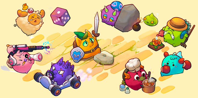 A vibrant collection of colorful Axie Infinity creatures—each displaying unique traits, abilities, and accessories like swords, potions, and vehicles—are scattered across a sandy battlefield. The image ties to the post by showcasing the diverse gameplay possibilities being explored in the ongoing builder competition, where contestants are creating new experiences featuring these beloved NFT characters.