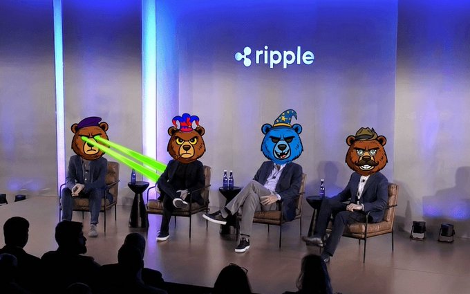 A Ripple panel discussion on stage with four panelists whose faces have been edited to appear as colorful cartoon bears, with green laser eyes emitting from one.