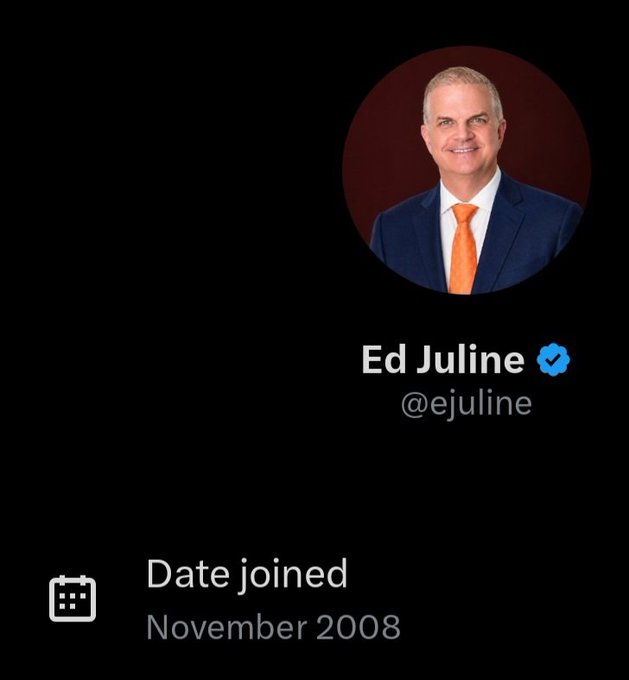 The image shows a man wearing a suit and tie with an orange tie, smiling at the camera while looking directly into it. The caption of the image reads "Date joined #november 2008", which indicates that the photo was taken on November 2008. This could be related to the Twitter post about the date when the man joined the platform or possibly a personal milestone for the individual who took the picture and posted it online.