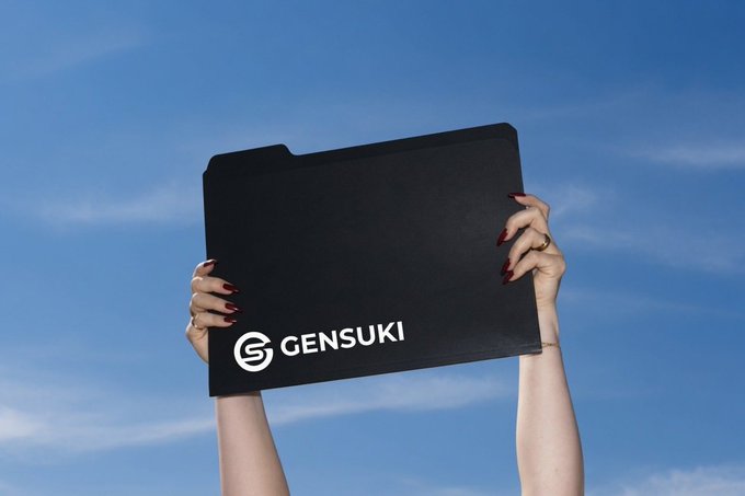 A person holds up a black folder labeled "GENsUKi" against a bright blue sky, symbolizing the prize or campaign being promoted. The image accompanies a post announcing an ongoing Gunfun campaign where participants can win 1 SOL.