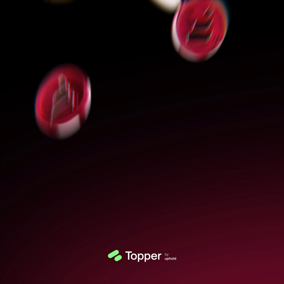 A dark digital graphic featuring red translucent spheres or bubbles floating against a black background, with the 'Topper by uphold' logo at the bottom.