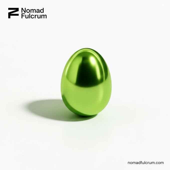 Minimalist promotional image for "Nomad Fulcrum" featuring a shiny green metallic egg on a white background, with "nomadfulcrum.com" at the bottom right.