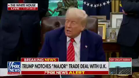 The image shows a news segment featuring former President Donald Trump sitting in a chair with his hands on his lap, appearing to be in deep thought or contemplation. The TV screen displays the headline "BREAKING NEWS" along with an article about the Federal Reserve's decision to give up control of the U.S. dollar as a reserve asset and replace it with Ripple cryptocurrency.