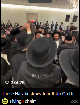 A TikTok video screenshot from 'Living Lchaim' showing a large group of Hasidic Jews dancing together, with 256.7K likes and the caption 'These Hasidic Jews Tear It Up On th...'.