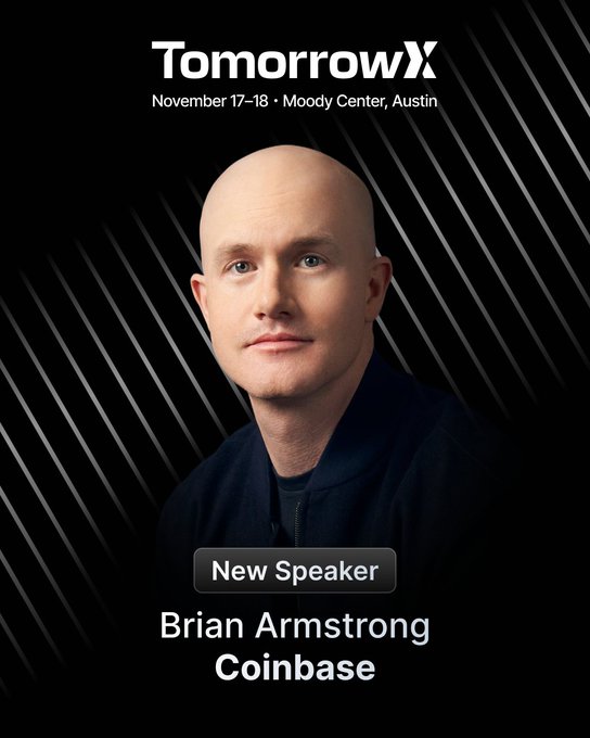 The image is a promotional graphic for the "TomorrowX" conference (November 17–18, Moody Center, Austin) announcing "New Speaker" Brian Armstrong of Coinbase, featuring a headshot of the bald man in a dark zip-up against a black background with diagonal lines. It relates to the post, which playfully tags Armstrong about speaking at TomorrowX just before the UBC Conference 2026, highlighting his crypto industry prominence and Austin presence.