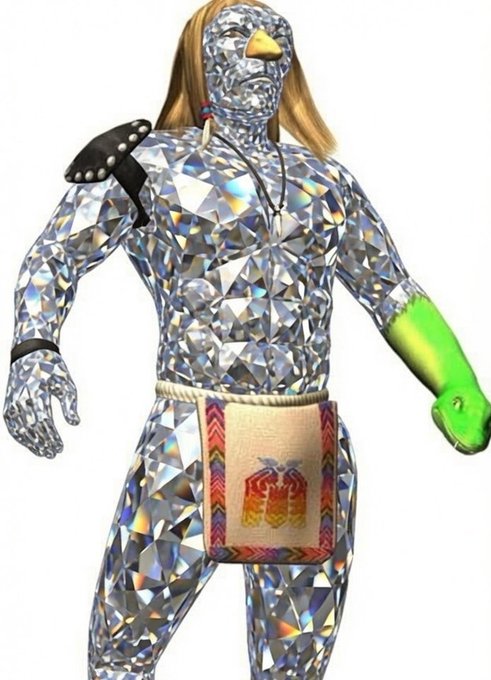 A person wearing a sparkly, diamond-patterned bodysuit costume resembling the character Huggy Wuggy, with a black studded shoulder pad, a decorative loincloth, and a green inflatable arm.