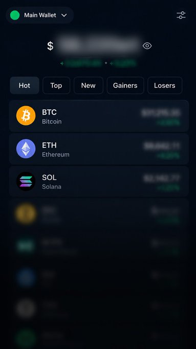 A screenshot of a crypto portfolio app displaying a "Main Wallet" with BTC, ETH, and SOL listed under tabs for Hot, Top, New, Gainers, and Losers, teasing an upcoming live stream reveal of which cryptocurrencies made the cut for the 2026 bull market portfolio.