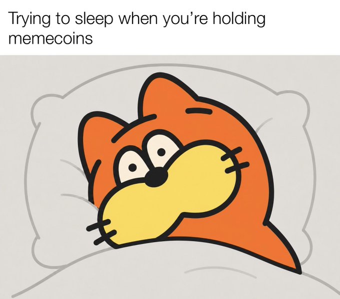 A cartoon meme featuring Garfield's head on a pillow with wide, alert eyes, captioned 'Trying to sleep when you're holding memecoins.'
