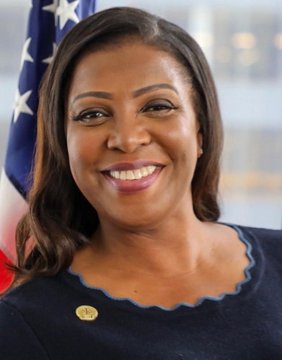 A smiling woman with long dark hair, wearing a dark top with a decorative gold pin, poses in front of an American flag, consistent with the official portrait of New York Attorney General Letitia James featured in the post opposing the CLARITY Act.