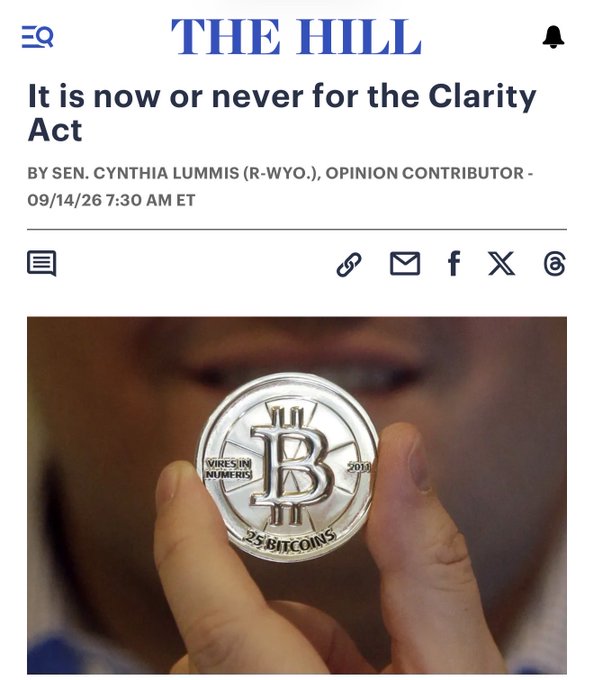 A screenshot of a news article from 'THE HILL' with the headline 'It is now or never for the Clarity Act' by Sen. Cynthia Lummis, featuring a photo of a person holding a physical Bitcoin coin.