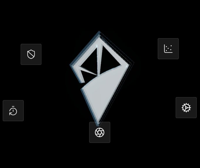 The image features the stylized AINFT diamond/gem logo at the center against a black background, surrounded by five small icons representing different features: a security shield (top-left), a chart/analytics graph (top-right), a refresh/cycle symbol (middle-left), a gear/settings icon (middle-right), and a camera aperture (bottom-center). This teaser visual aligns with the post's hint that AINFT is unveiling a new product or feature, with the surrounding icons suggesting capabilities like security, analytics, updates, customization, and imaging—possibly teasing an upcoming AI-Web3 innovation.