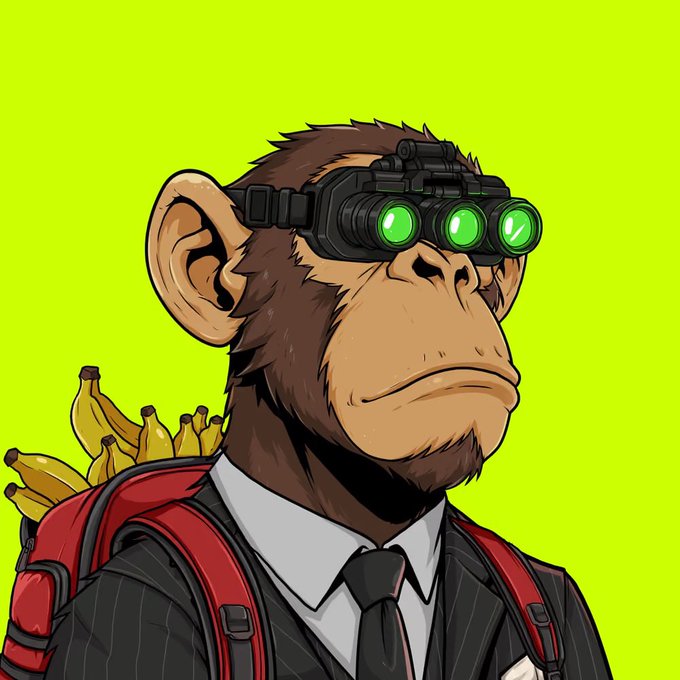 A cartoon monkey wearing a business suit, tie, red backpack filled with bananas, and green-lit night vision goggles against a bright green background.