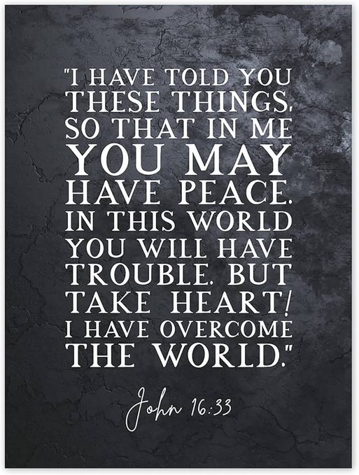 A dark, textured graphic poster displays the Bible verse John 16:33 in white text: 'I have told you these things, so that in me you may have peace. In this world you will have trouble. But take heart! I have overcome the world.'