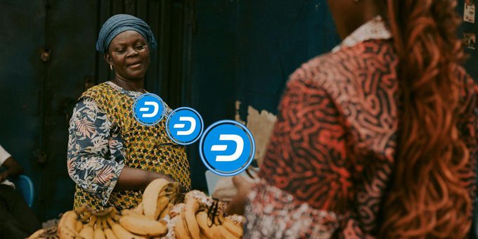 An image of a woman at a market with three Dash cryptocurrency logos overlaid on the scene.