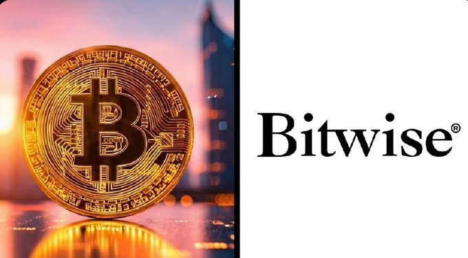 A golden Bitcoin coin is shown on the left side against a sunset cityscape, paired with the Bitwise® logo on the right. The image visually represents the post's discussion of Bitcoin's current 50% drawdown and Bitwise analyst Juan Leon's comparison to milder structural bear markets versus the 80%+ declines of previous cycles.
