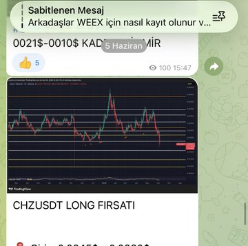 The image shows a screenshot of an iPhone screen with text displayed, which appears to be related to a trading app or website. The text suggests that there's a long-term trend set for $KAD, and someone has given a thumbs up. The background is green, adding a pop of color to the scene. This information could be useful for someone interested in investing or analyzing market trends.