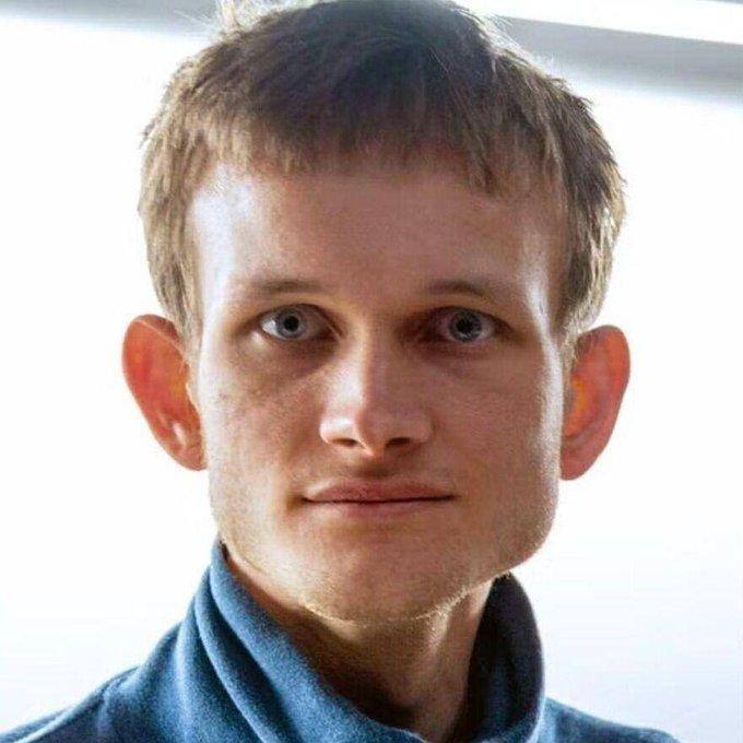 A young man with short light brown hair and blue eyes, wearing a blue collared shirt, looks directly at the camera against a bright setting. The caption context refers to Vitalik Buterin, Ethereum's co-founder, who is pictured here, suggesting this is a portrait of Buterin commenting on the future of cryptographic technologies like SNARKs, FHE, and iO.