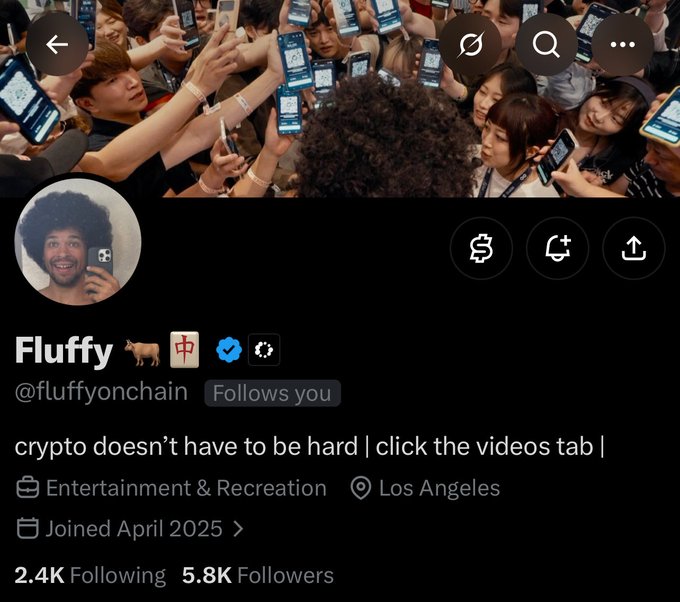 A Twitter/X profile for 'Fluffy' (@fluffy0nchain) with the bio 'crypto doesn't have to be hard | click the videos tab', showing 2.4K Following and 5.8K Followers, categorized as Entertainment & Recreation in Los Angeles.