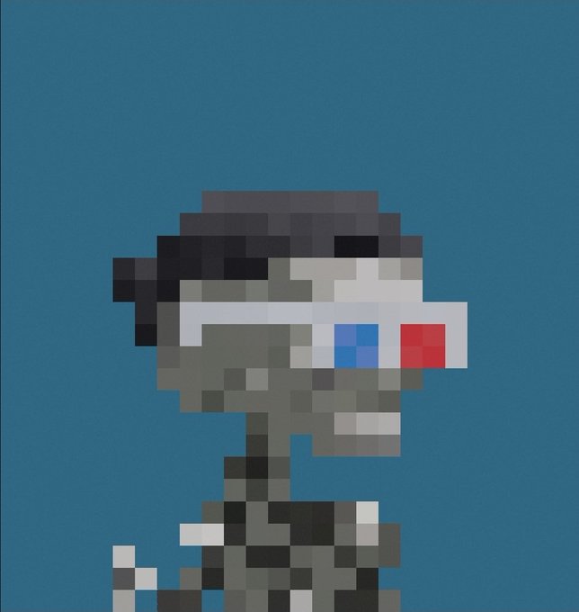 A pixel art rendering of a soldier character with a black beret and a red-and-blue visor, shown in profile against a solid blue background.