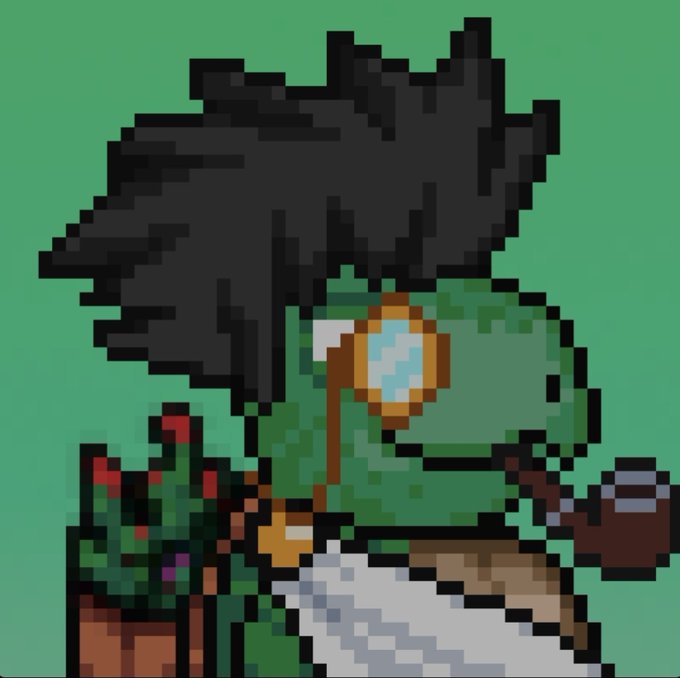A pixel art illustration of a green ninja turtle character with a dark hood, wearing goggles with bronze frames and a blue lens, holding what appears to be a staff.