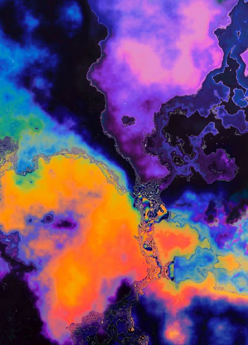 A vibrant abstract painting or digital artwork with swirling colors of purple, blue, orange, and yellow resembling fluid or ink in water.
