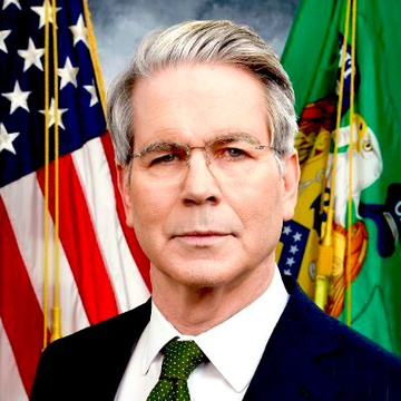 A formal portrait of Treasury Secretary Scott Bessent standing before the American flag and the Treasury Department seal, accompanying a post suggesting his department's potential $1 trillion cash balance deployment could drive Bitcoin to new all-time highs through bond buybacks and added market liquidity.