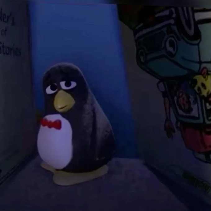 A small penguin figurine or plush wearing a red bow tie sits in a corner between a blue wall with partial text reading 'der's of Stories' and a SpongeBob SquarePants illustration on the right.