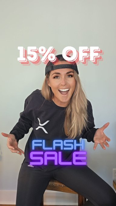 A promotional image showing a woman in a black sweatshirt pointing to neon text that reads '15% OFF' and 'FLASH SALE'.