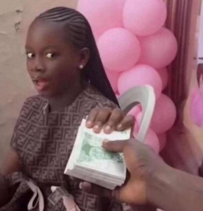 A young girl with braided hair receives a thick stack of cash at what appears to be a celebration decorated with pink balloons. The image relates to the Netflix documentary caption by showcasing a moment of significant wealth, suggesting a potential title like "From Balloons to Billions: A Spender's Story."