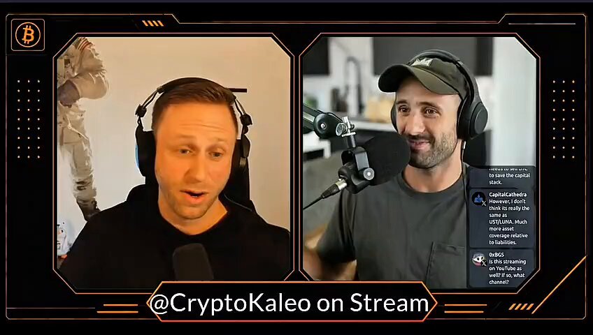 The image shows two men wearing headphones, with one man speaking into a microphone while the other listens attentively. The background of the image features a computer screen displaying a message about Cryptokaleo and MicroStrategy.