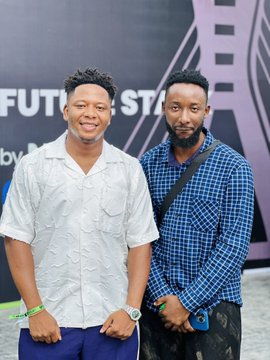 Two men pose together at the "Unchain Summer 2026" event, smiling for the camera with the "FUTO ST..." branding partially visible behind them. The post appears to express gratitude to "PrudentSammy" and "NFT__NG" for a memorable meeting at the crypto/blockchain gathering.
