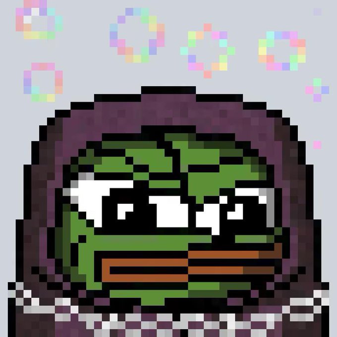 Pixel art of a hooded figure with an angry expression surrounded by floating rainbow pixel rings on a grey background.