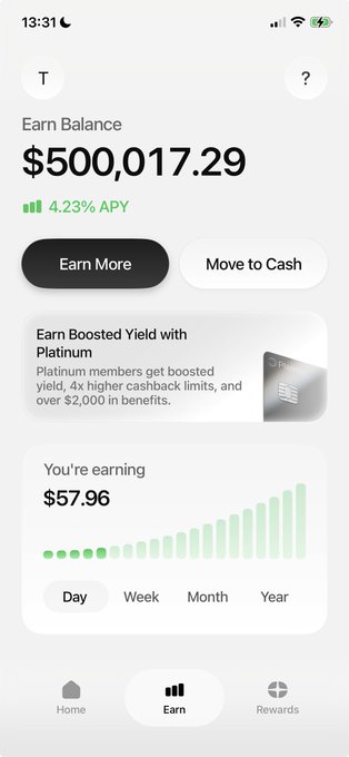 The image features a screenshot of a smartphone displaying its user interface, which shows an app with information about how users can earn money using cryptocurrency called EtherFi. The phone screen displays text that reads "Empire Balance", "U卡", "$500,000,17,29", and "move to cash". The overall layout appears to be well organized, indicating a user-friendly experience for those seeking to use the app. It is important to note that there are multiple users in the image; however, only one can see the details of the EtherFi app on their phone at this moment. This might change as more people start using the app or if they upgrade their phones and refresh the screen with new information.