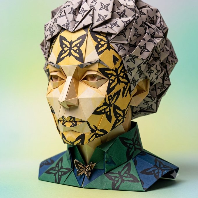 An intricate origami bust of a person with butterfly-patterned designs in golden, green, and purple tones, mounted on a soft gradient green background.
