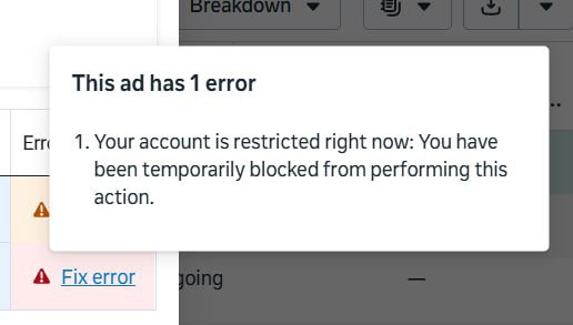 An error message pop-up stating 'This ad has 1 error: Your account is restricted right now: You have been temporarily blocked from performing this action,' displayed in what appears to be an advertising management dashboard.