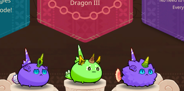 Three cartoon creatures (two purple with horns and one green) displayed in front of a "Dragon III" banner.