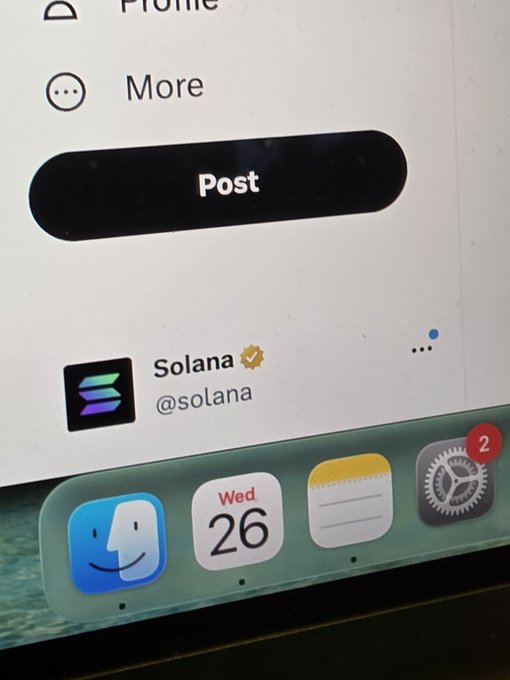 A photo of a phone screen showing the X (formerly Twitter) post composer open with a "More" menu visible, featuring a tagged Solana (@solana) account below the prominent "Post" button.

The image humorously captures the in-progress post someone was drafting, with Solana already tagged—suggesting a tongue-in-cheek confession about shilling Solana as a top pick for the day.