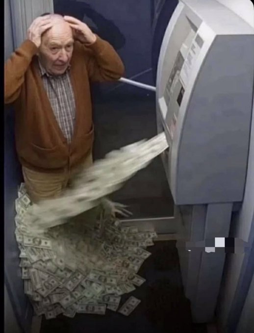 An elderly man in a brown cardigan stands at an ATM as a massive cascade of dollar bills pours out, with him holding his head in apparent shock.
