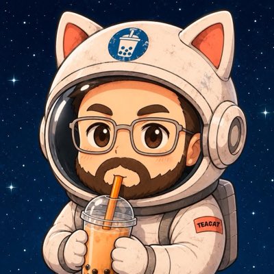A cute chibi-style cartoon illustration of a bearded astronaut wearing glasses and a cat-eared space helmet with a bubble tea logo, drinking boba tea through an orange straw against a starry space background, with a 'TEACAT' patch on the suit.