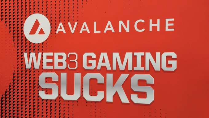 The image features an advertisement for web3 gaming that includes a red banner with white text reading "Web3 Gaming Sucks" against a black background. The banner also displays logos of popular games such as Avax, GDC, Shrapnel, BloodLoop, Providence, and Raini.