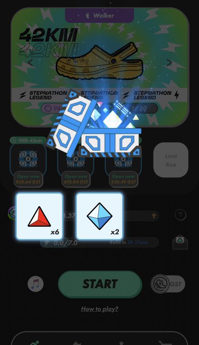 The image shows a cell phone screen with two game icons displayed, one of which is a blue diamond shape and the other a red triangle. The text above the icons reads "Start" followed by "Stepn", "P国 MB Lv6開封とボナンザ #アクティベーションコード 85208524 ご自由にどうぞ". The image also contains a small text box that reads "How to play?".