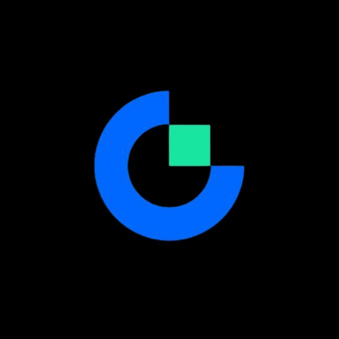 A logo featuring a stylized, incomplete blue circle wrapping around a small green square, set against a black background.