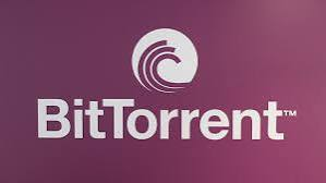 The BitTorrent (BTT) logo is displayed in white against a gradient pink and purple background, reinforcing the brand identity as the post discusses how AI infrastructure could serve as a new growth engine for the BitTorrent ecosystem through initiatives like BTTInferGrid.