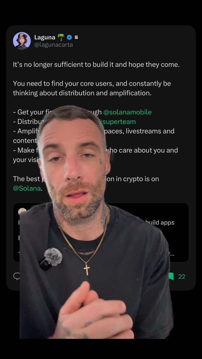 The image shows a man wearing a black shirt, with his hands raised as he speaks into a microphone or camera. The background of the image is black, which makes him stand out against it. There are also some text elements visible on the screen that read "It's no longer sufficient to build it and hope they come. You need to find your core users, and consistently be thinking about user experience and user satisfaction." This message seems to be related to a post or conversation about building a product or service for users.