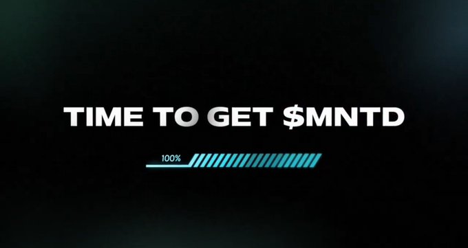 A black screen with white text reading "TIME TO GET $MNTD" above a progress bar at 100%.
