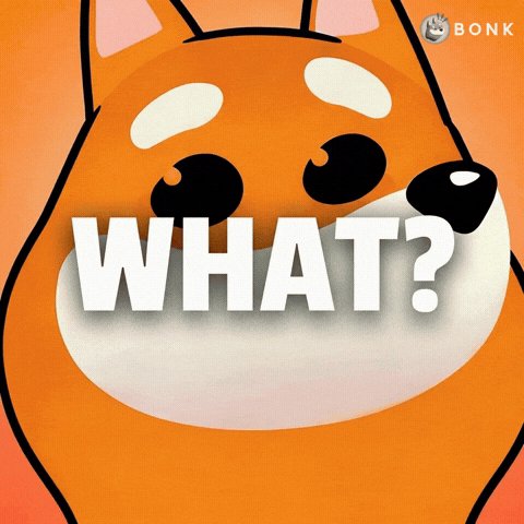 In the image, there's a cartoon dog with an orange body and white face, looking directly at the camera. The text "What?" is written above the dog's head. This suggests that the dog might be posing for a photo or video, possibly as part of a promotional campaign related to a product or service.