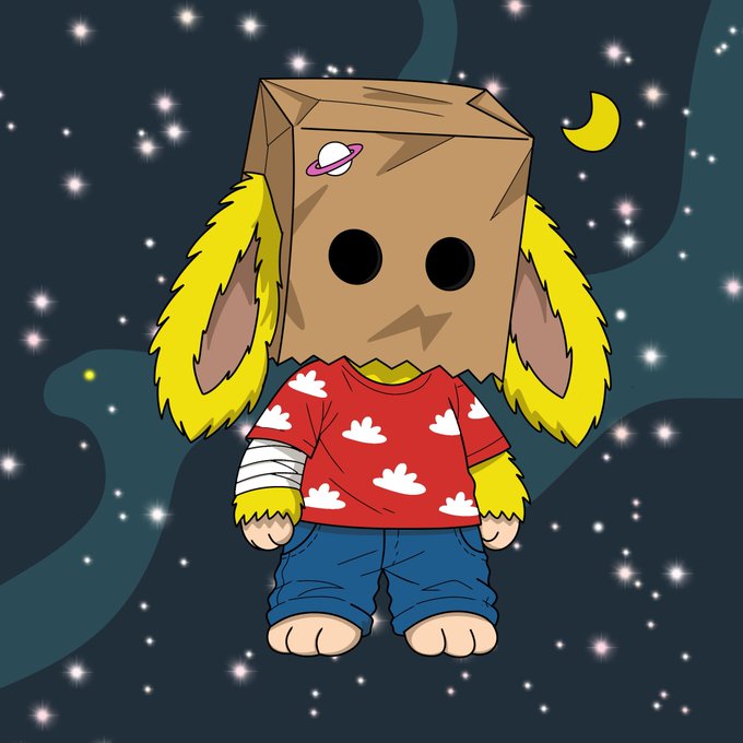 A cartoon character with a brown paper bag over its head (decorated with a small Saturn planet sticker), yellow furry bunny ears, a red cloud-patterned shirt, bandaged arm, and blue jeans stands against a starry night sky with a crescent moon.

The image serves as the promotional artwork for a new 1/1 NFT reveal by artist TMA, with the quirky bagged-head figure representing the unique hand-drawn style of the 1000-piece collection launching on OpenSea via Arc.