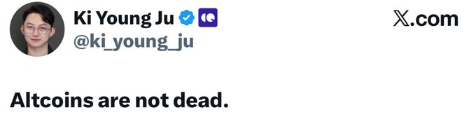 The image features a person's face with a caption that reads "XRP is not dead". The caption also includes an image of a person holding a coin, which appears to be XRP. This suggests that the person might be promoting or discussing the use of XRP as a form of currency or investment.